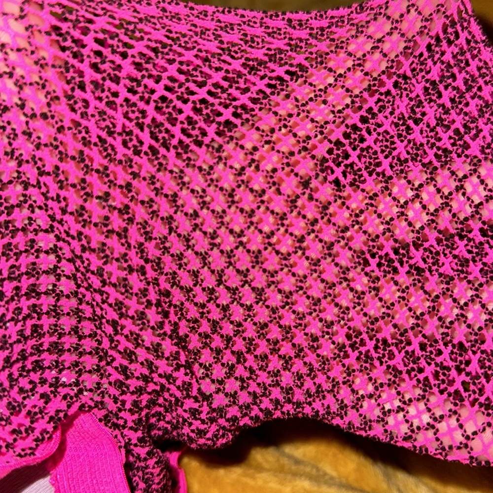 Pink and black fishnet tights
